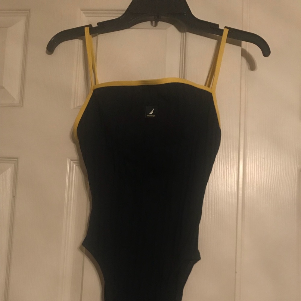 Nautical one piece with shorts.